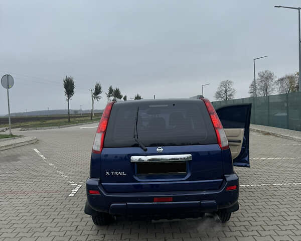 Синій Ніссан ІксТрейл, об'ємом двигуна 2 л та пробігом 222 тис. км за 4400 $, фото 1 на Automoto.ua