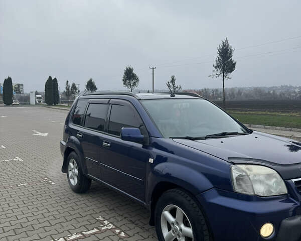 Синий Ниссан ИксТрейл, объемом двигателя 2 л и пробегом 222 тыс. км за 4700 $, фото 3 на Automoto.ua
