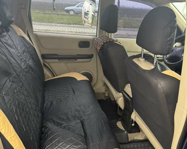 Синий Ниссан ИксТрейл, объемом двигателя 2 л и пробегом 222 тыс. км за 4700 $, фото 5 на Automoto.ua
