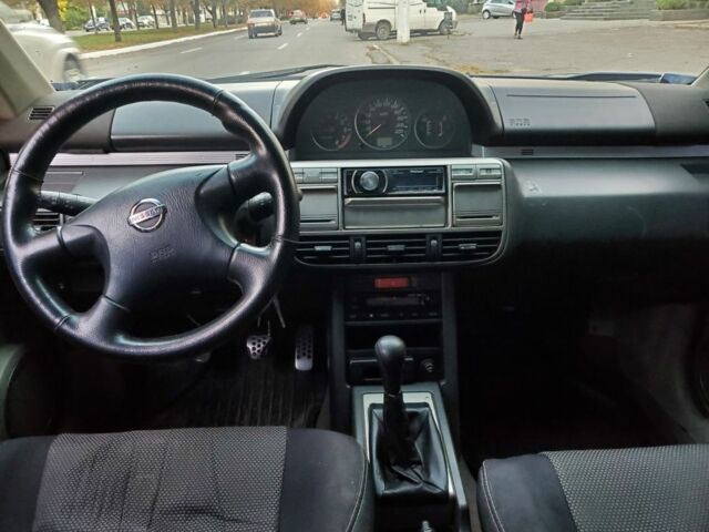 Синій Ніссан ІксТрейл, об'ємом двигуна 2 л та пробігом 300 тис. км за 4400 $, фото 4 на Automoto.ua