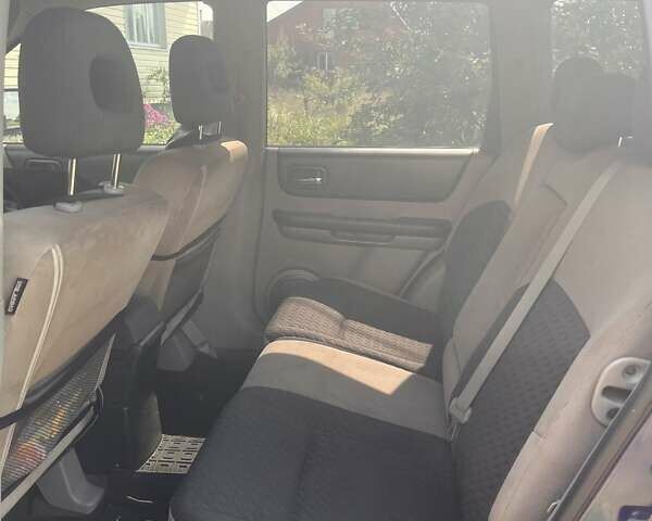 Синий Ниссан ИксТрейл, объемом двигателя 2 л и пробегом 246 тыс. км за 5400 $, фото 12 на Automoto.ua