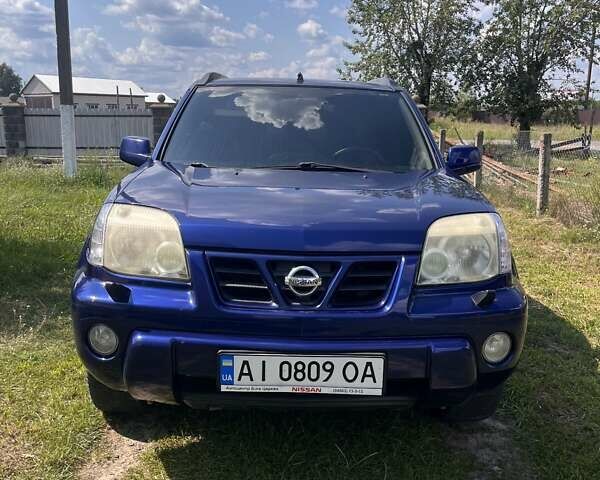 Синий Ниссан ИксТрейл, объемом двигателя 2 л и пробегом 246 тыс. км за 5400 $, фото 7 на Automoto.ua