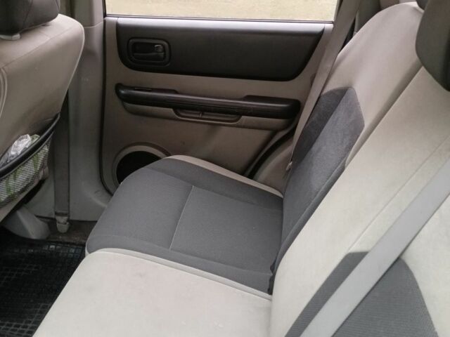 Синий Ниссан ИксТрейл, объемом двигателя 2.2 л и пробегом 278 тыс. км за 2900 $, фото 7 на Automoto.ua