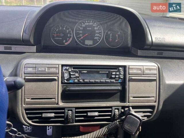 Синий Ниссан ИксТрейл, объемом двигателя 2 л и пробегом 246 тыс. км за 5400 $, фото 28 на Automoto.ua