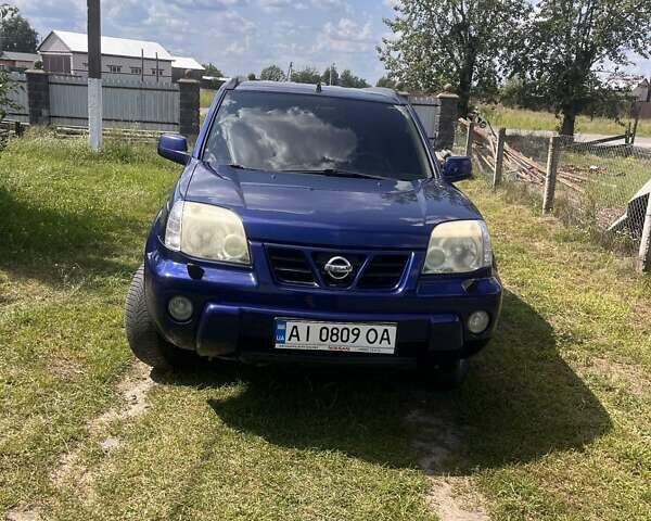 Синий Ниссан ИксТрейл, объемом двигателя 2 л и пробегом 246 тыс. км за 5400 $, фото 21 на Automoto.ua