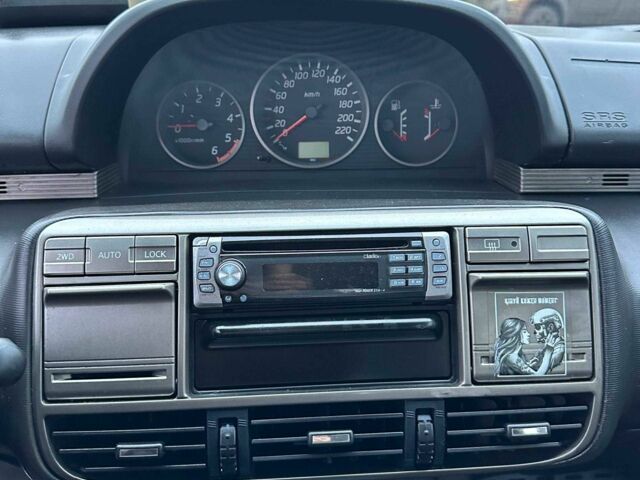 Синий Ниссан ИксТрейл, объемом двигателя 2.2 л и пробегом 327 тыс. км за 3300 $, фото 12 на Automoto.ua