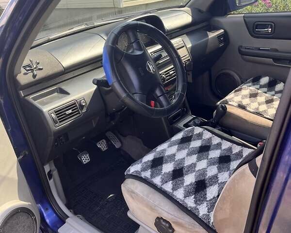 Синий Ниссан ИксТрейл, объемом двигателя 2 л и пробегом 246 тыс. км за 5400 $, фото 26 на Automoto.ua