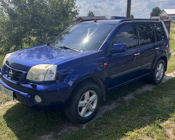 Синий Ниссан ИксТрейл, объемом двигателя 2 л и пробегом 246 тыс. км за 5400 $, фото 23 на Automoto.ua