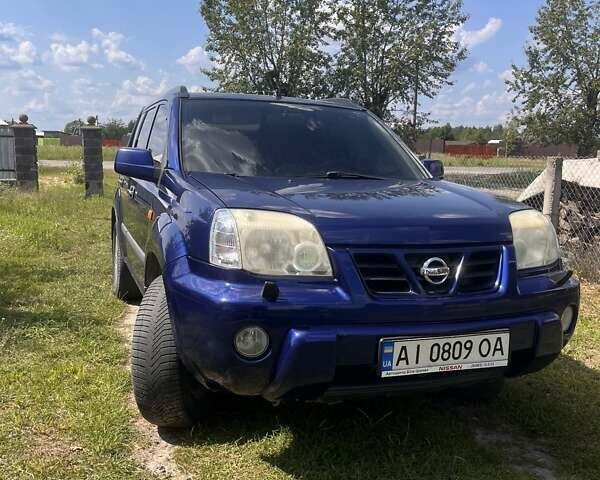 Синий Ниссан ИксТрейл, объемом двигателя 2 л и пробегом 246 тыс. км за 5400 $, фото 5 на Automoto.ua