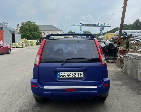 Синий Ниссан ИксТрейл, объемом двигателя 2 л и пробегом 350 тыс. км за 6500 $, фото 6 на Automoto.ua