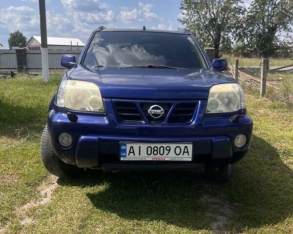 Синий Ниссан ИксТрейл, объемом двигателя 2 л и пробегом 246 тыс. км за 5400 $, фото 24 на Automoto.ua