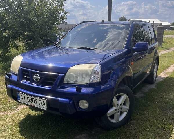 Синий Ниссан ИксТрейл, объемом двигателя 2 л и пробегом 246 тыс. км за 5400 $, фото 19 на Automoto.ua