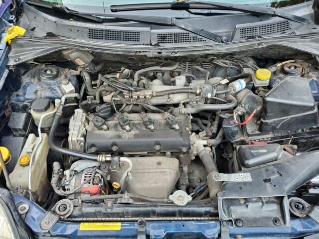 Синій Ніссан ІксТрейл, об'ємом двигуна 2 л та пробігом 300 тис. км за 4400 $, фото 5 на Automoto.ua