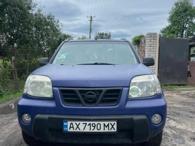 Синій Ніссан ІксТрейл, об'ємом двигуна 2 л та пробігом 300 тис. км за 6000 $, фото 5 на Automoto.ua