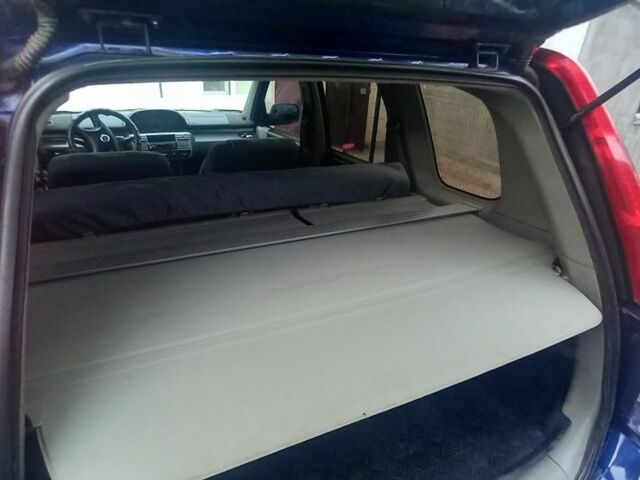 Синий Ниссан ИксТрейл, объемом двигателя 2 л и пробегом 500 тыс. км за 5400 $, фото 7 на Automoto.ua