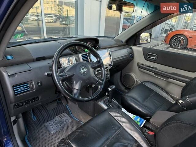 Синий Ниссан ИксТрейл, объемом двигателя 2.5 л и пробегом 330 тыс. км за 7500 $, фото 15 на Automoto.ua