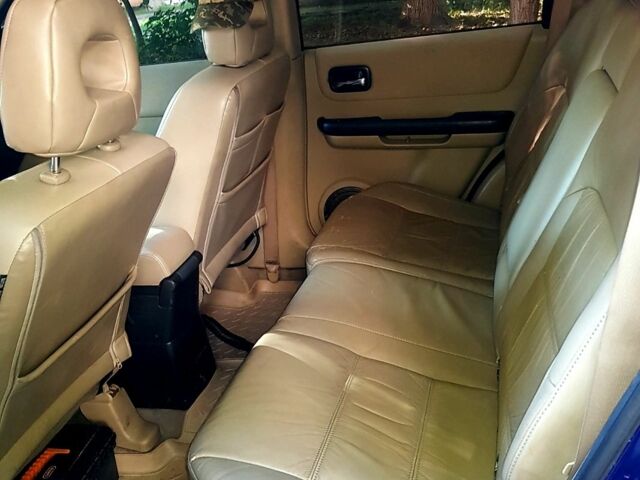 Синий Ниссан ИксТрейл, объемом двигателя 2.18 л и пробегом 260 тыс. км за 5400 $, фото 5 на Automoto.ua