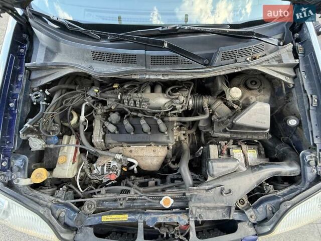 Синий Ниссан ИксТрейл, объемом двигателя 2.5 л и пробегом 330 тыс. км за 7500 $, фото 24 на Automoto.ua