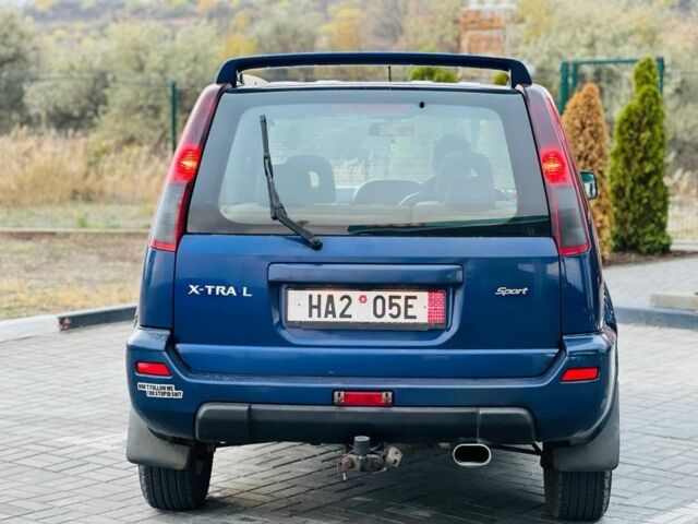 Синий Ниссан ИксТрейл, объемом двигателя 2.2 л и пробегом 100 тыс. км за 2750 $, фото 4 на Automoto.ua