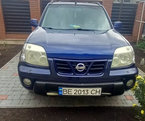 Синий Ниссан ИксТрейл, объемом двигателя 2 л и пробегом 500 тыс. км за 5400 $, фото 1 на Automoto.ua