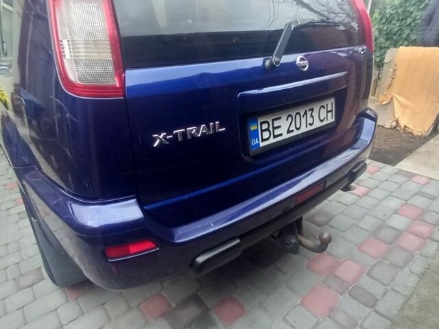Синий Ниссан ИксТрейл, объемом двигателя 2 л и пробегом 500 тыс. км за 5400 $, фото 4 на Automoto.ua