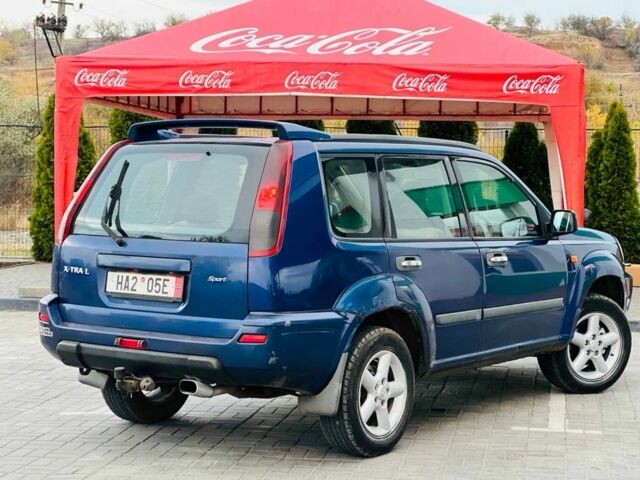 Синий Ниссан ИксТрейл, объемом двигателя 2.2 л и пробегом 100 тыс. км за 2750 $, фото 5 на Automoto.ua