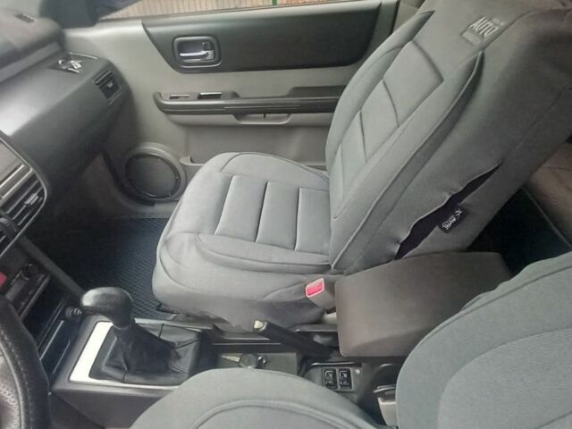 Синий Ниссан ИксТрейл, объемом двигателя 2 л и пробегом 500 тыс. км за 5400 $, фото 8 на Automoto.ua