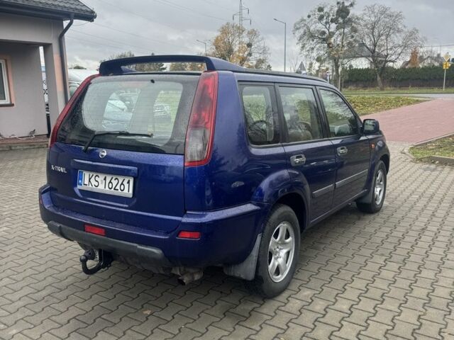 Синий Ниссан ИксТрейл, объемом двигателя 2.2 л и пробегом 187 тыс. км за 3494 $, фото 2 на Automoto.ua