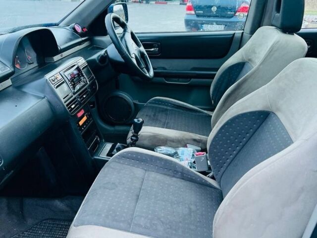 Синий Ниссан ИксТрейл, объемом двигателя 2.2 л и пробегом 100 тыс. км за 2750 $, фото 11 на Automoto.ua