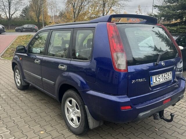 Синий Ниссан ИксТрейл, объемом двигателя 2.2 л и пробегом 187 тыс. км за 3494 $, фото 3 на Automoto.ua