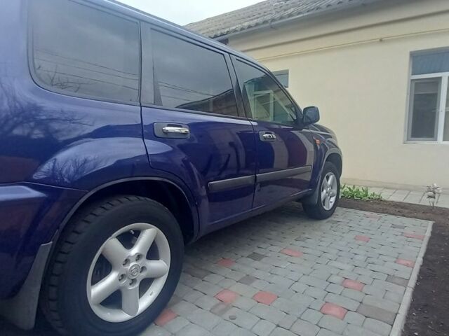 Синий Ниссан ИксТрейл, объемом двигателя 2 л и пробегом 500 тыс. км за 5400 $, фото 6 на Automoto.ua