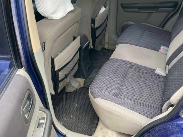 Синій Ніссан ІксТрейл, об'ємом двигуна 2 л та пробігом 300 тис. км за 6000 $, фото 4 на Automoto.ua