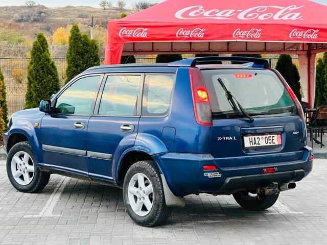 Синий Ниссан ИксТрейл, объемом двигателя 2.2 л и пробегом 100 тыс. км за 2750 $, фото 3 на Automoto.ua