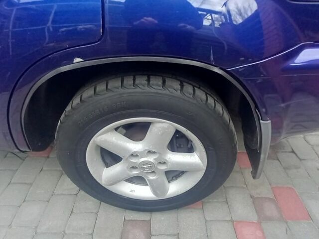 Синий Ниссан ИксТрейл, объемом двигателя 2 л и пробегом 500 тыс. км за 5400 $, фото 3 на Automoto.ua