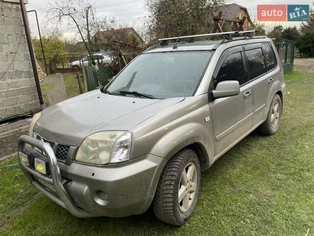 Синий Ниссан ИксТрейл, объемом двигателя 2.4 л и пробегом 299 тыс. км за 4600 $, фото 9 на Automoto.ua