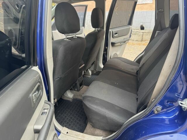 Синий Ниссан ИксТрейл, объемом двигателя 2.2 л и пробегом 300 тыс. км за 2650 $, фото 12 на Automoto.ua