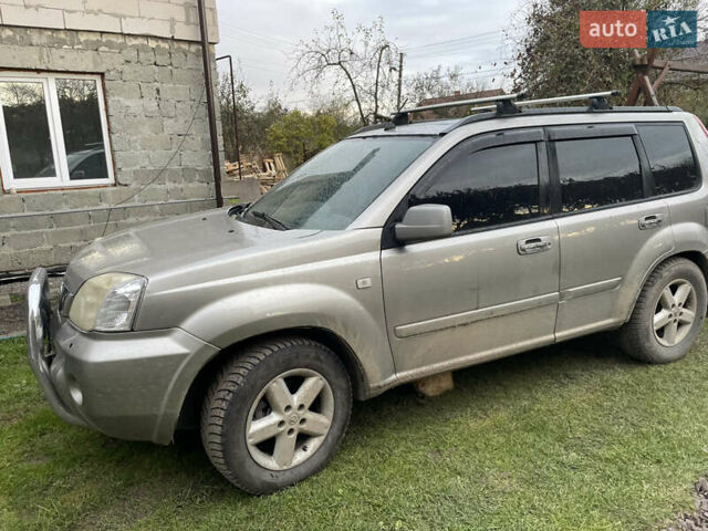 Синий Ниссан ИксТрейл, объемом двигателя 2.4 л и пробегом 299 тыс. км за 4600 $, фото 18 на Automoto.ua