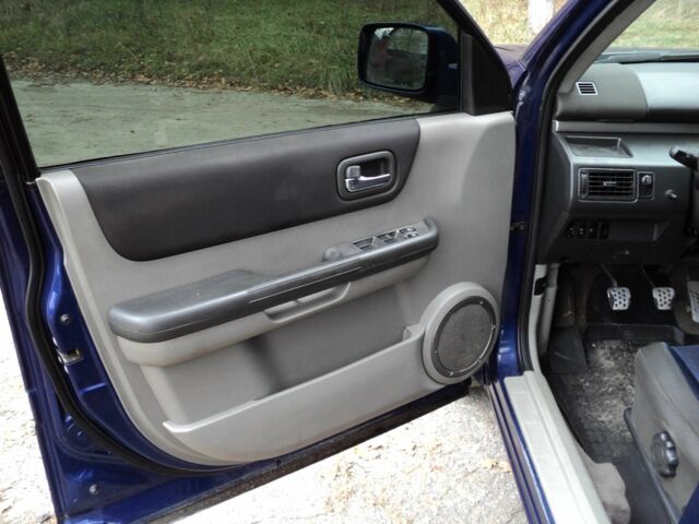 Синий Ниссан ИксТрейл, объемом двигателя 2.2 л и пробегом 300 тыс. км за 3000 $, фото 5 на Automoto.ua