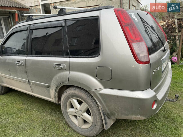 Синий Ниссан ИксТрейл, объемом двигателя 2.4 л и пробегом 299 тыс. км за 4600 $, фото 17 на Automoto.ua