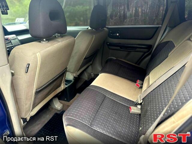 Синий Ниссан ИксТрейл, объемом двигателя 2.2 л и пробегом 292 тыс. км за 5800 $, фото 8 на Automoto.ua