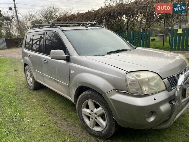 Синий Ниссан ИксТрейл, объемом двигателя 2.4 л и пробегом 299 тыс. км за 4600 $, фото 14 на Automoto.ua