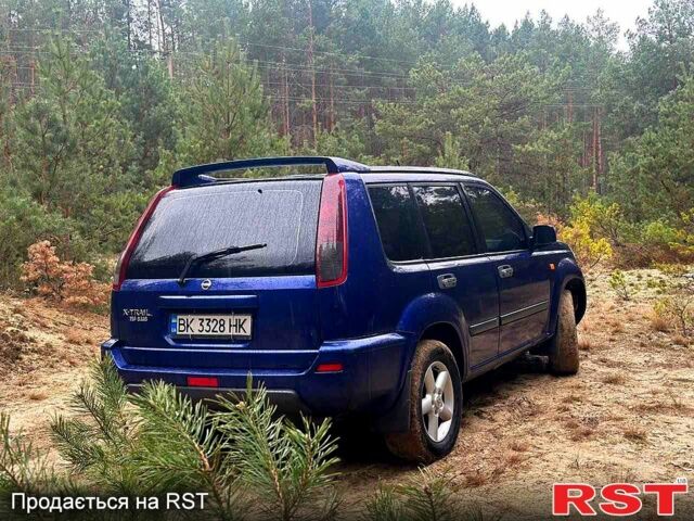 Синий Ниссан ИксТрейл, объемом двигателя 2.2 л и пробегом 292 тыс. км за 5800 $, фото 4 на Automoto.ua
