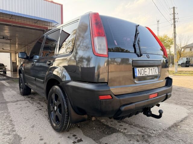 Синий Ниссан ИксТрейл, объемом двигателя 2 л и пробегом 400 тыс. км за 2850 $, фото 5 на Automoto.ua