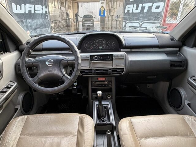 Синий Ниссан ИксТрейл, объемом двигателя 2 л и пробегом 400 тыс. км за 2850 $, фото 12 на Automoto.ua