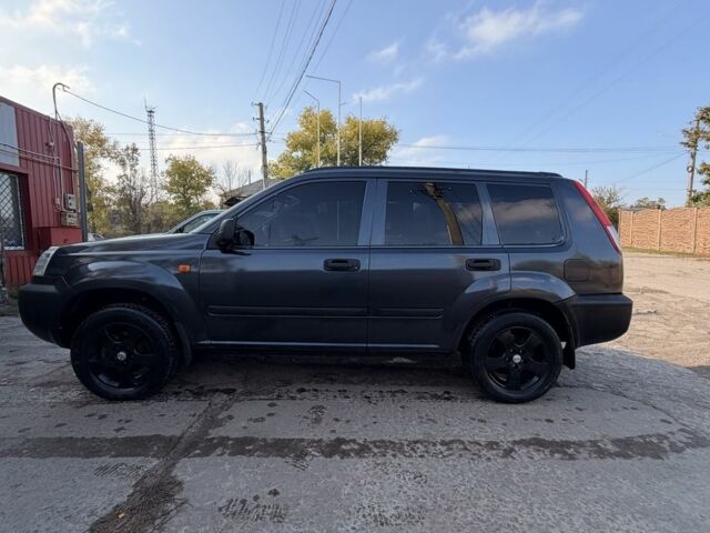 Синий Ниссан ИксТрейл, объемом двигателя 2 л и пробегом 400 тыс. км за 2850 $, фото 4 на Automoto.ua