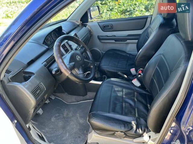 Синий Ниссан ИксТрейл, объемом двигателя 2.2 л и пробегом 274 тыс. км за 5450 $, фото 3 на Automoto.ua