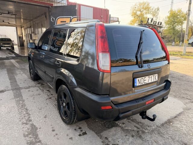 Синий Ниссан ИксТрейл, объемом двигателя 2 л и пробегом 400 тыс. км за 2850 $, фото 6 на Automoto.ua