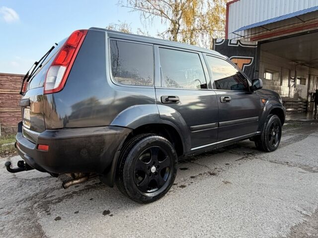 Синий Ниссан ИксТрейл, объемом двигателя 2 л и пробегом 400 тыс. км за 2850 $, фото 8 на Automoto.ua