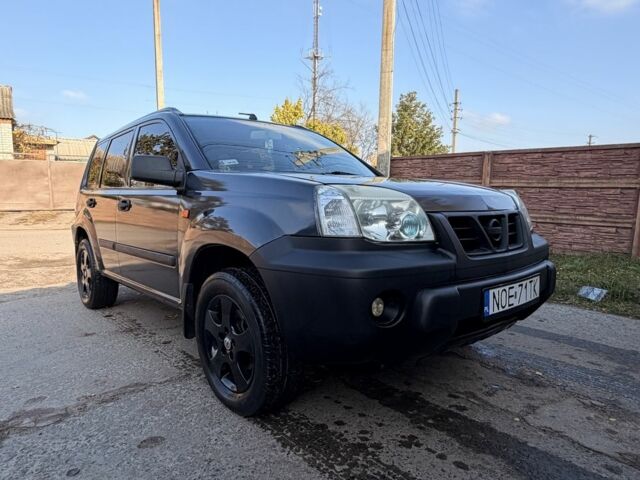 Синий Ниссан ИксТрейл, объемом двигателя 2 л и пробегом 400 тыс. км за 2850 $, фото 9 на Automoto.ua