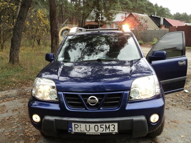 Синий Ниссан ИксТрейл, объемом двигателя 2.2 л и пробегом 300 тыс. км за 3000 $, фото 10 на Automoto.ua